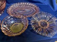 Pink Depression Glass pieces, up to 12" W
