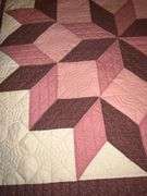 Patchwork quilt, hand quilted
