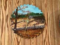 Hand painted saw blade clock, artist signed