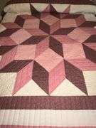 Patchwork quilt, hand quilted