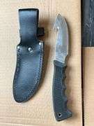 Remington skinning knife, 4" blade and leather sheath