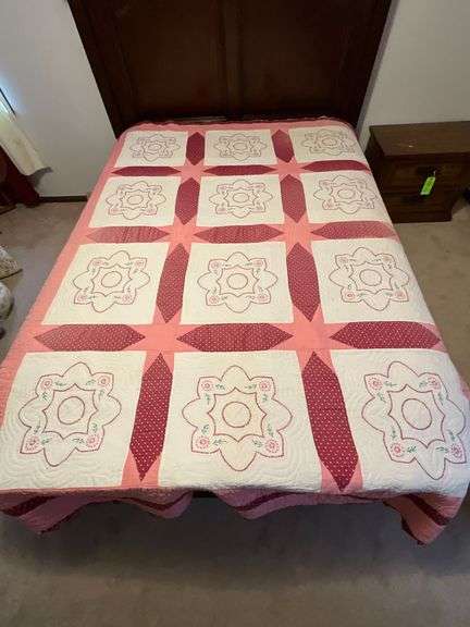 Embroidered quilt, some fading, hand quilted image