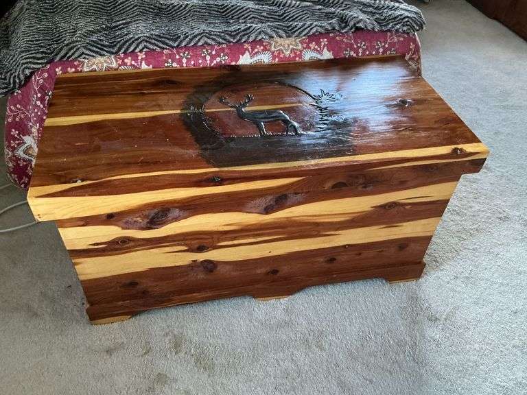 Cedar chest with deer carving on top image