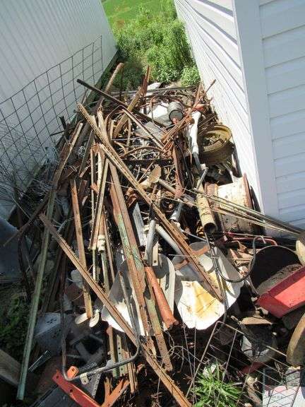 Scrap metal, steel t-post, wheels image
