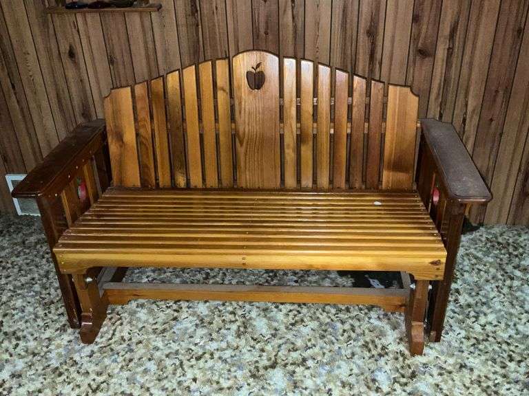 Wooden glider with apple cutout image