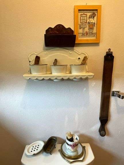 Straight razors, enamel shelf with flower pots, enamel soap dish