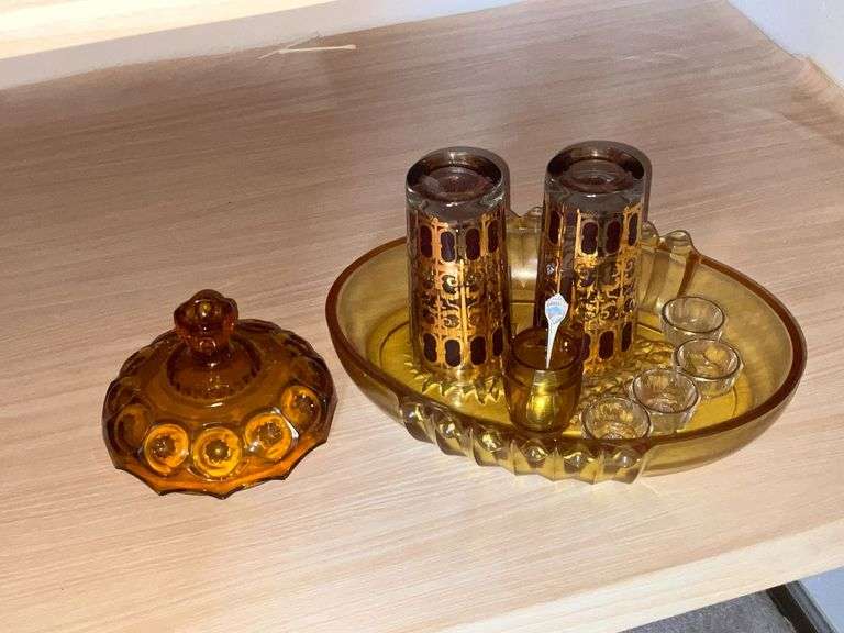 Amber glass pieces, salt cellars, pair of glasses
