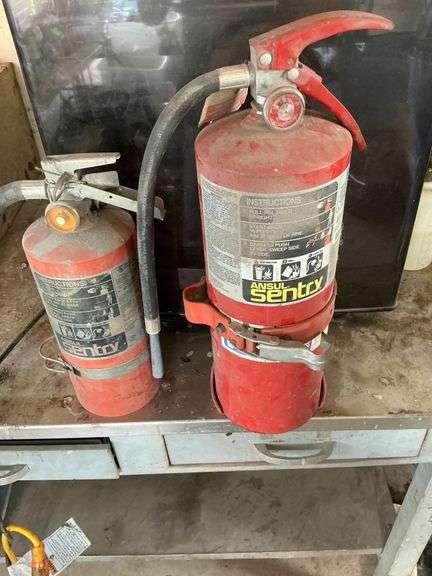 4 Sentry ABC fire extinguishers image