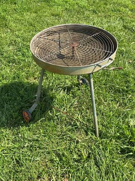 Vintage charcoal grill with grate adjustment image
