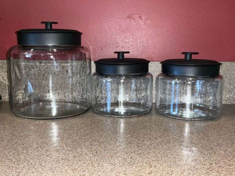 Set of 3 Ankor Hocking glass canisters with metal sealing lids image