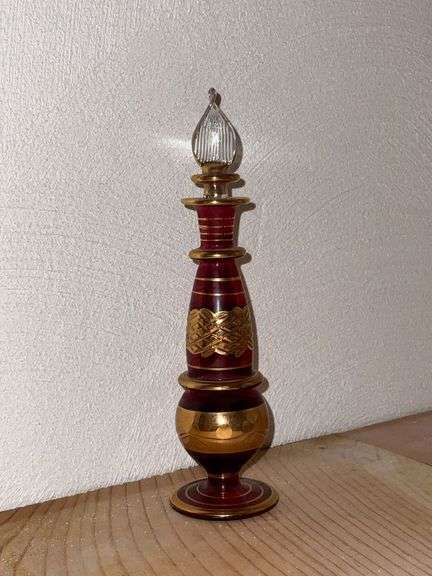 Ruby and gold decorated perfume bottle