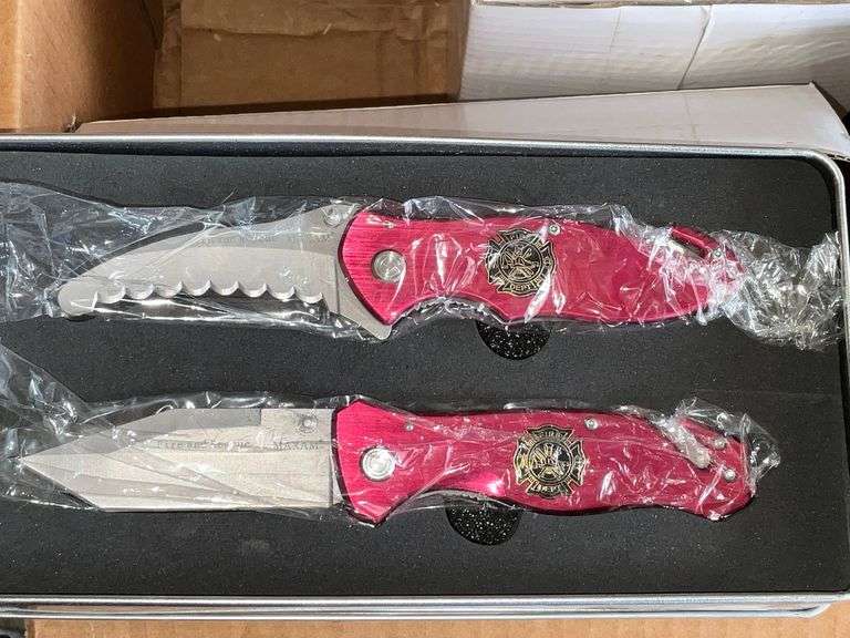 Pair of Fire Dept. knives in presentation tin image