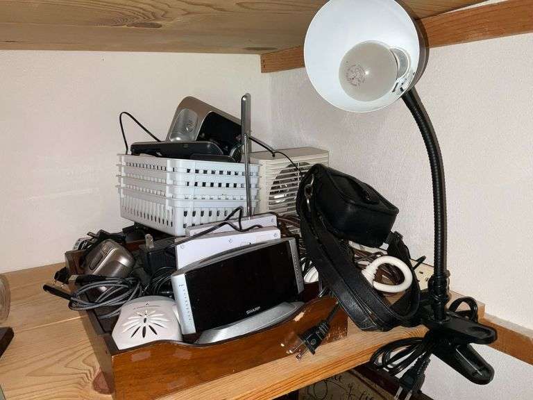 Office supplies, desk lamp, telephones, alarm clocks image