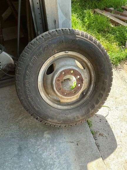 Spare dually 8-bolt wheel with used tires image