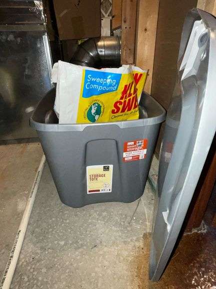 18 gallon tote with partial bag of Kleen sweep image