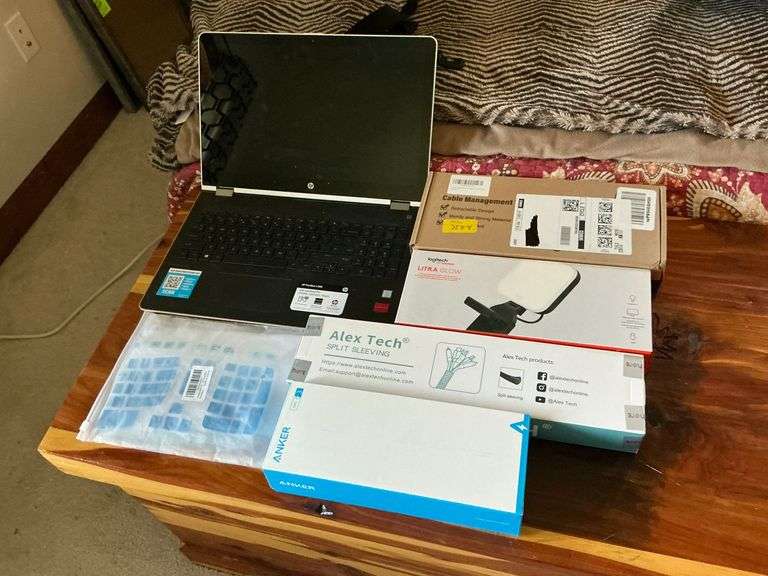 HP Pavillion X360 laptop, no power cord, silicone keyboard cover image