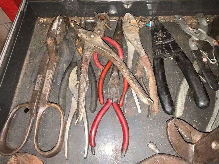Pliers, channel lock, snap ring, tin snips, etc.