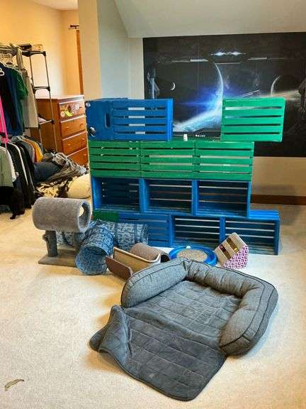 Homemade cat tower, assorted cat toys and dog bed image