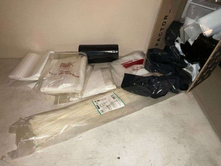 Plastic bags, zip ties, trash bags image