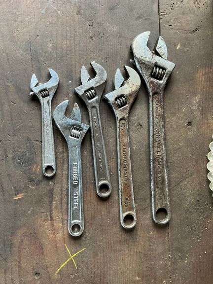 Assortment of adjustable wrenches up to 12" image