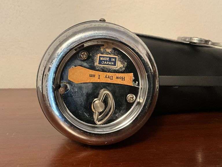 Musical pistol flask