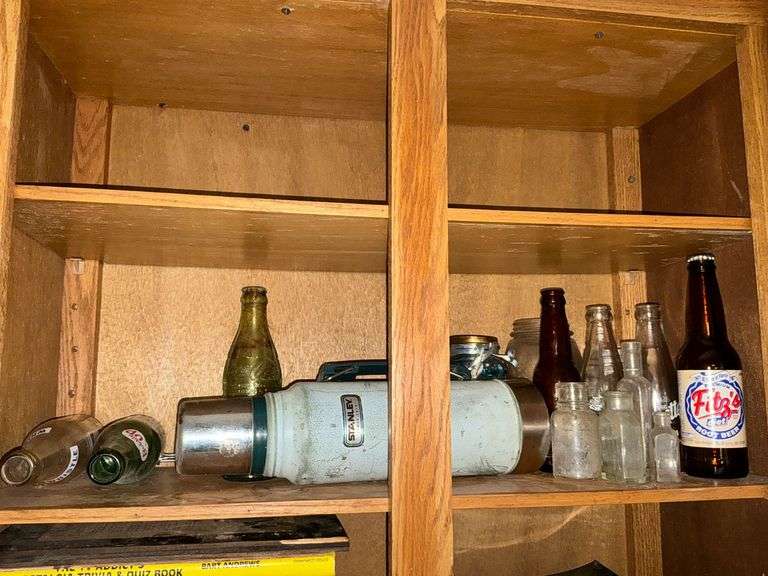 Stanley Thermos and vintage bottles image