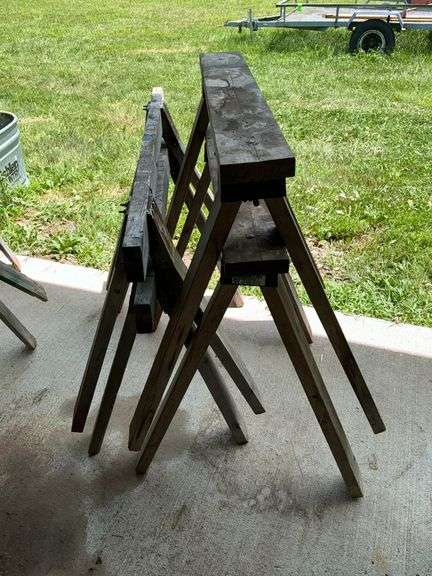 4 wooden saw horses image