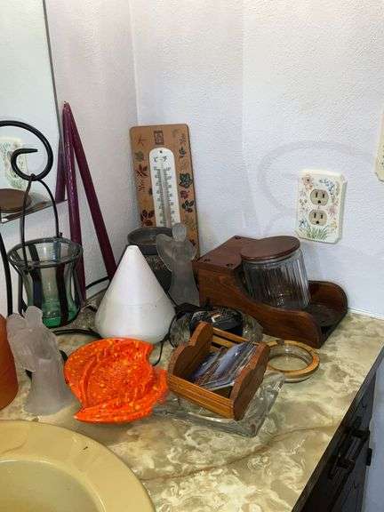 Candleholders, thermometer, ashtrays, etc.