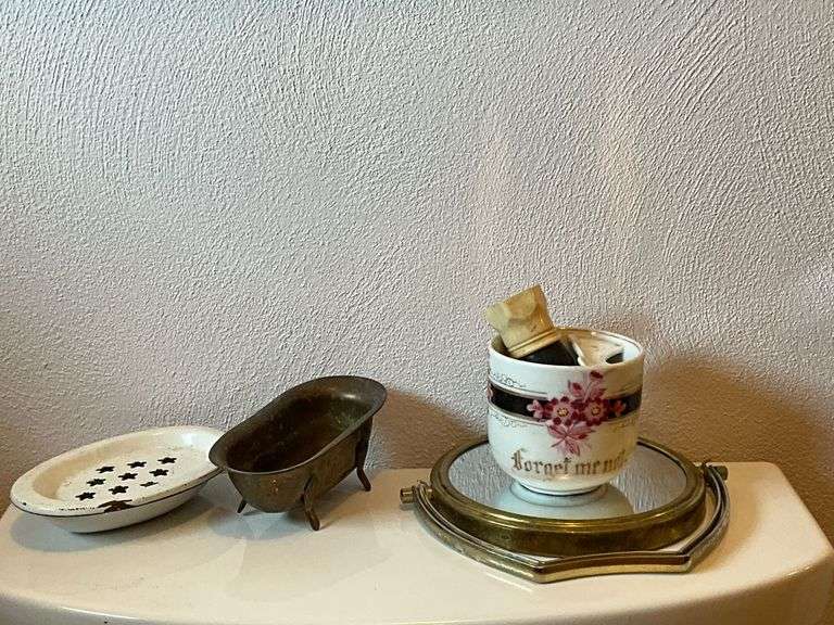 Straight razors, enamel shelf with flower pots, enamel soap dish