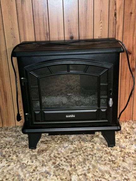 DuraFlame electric fireplace with remote image
