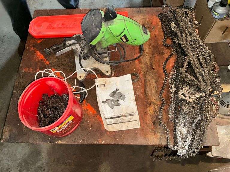 Chain saw sharpener, chains, cover, chain oil, etc. image