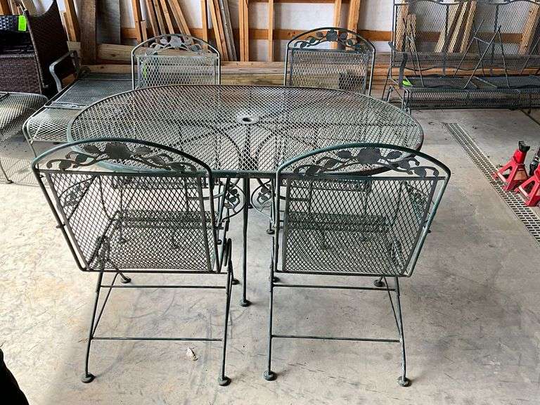 Metal patio table and 4 chairs image