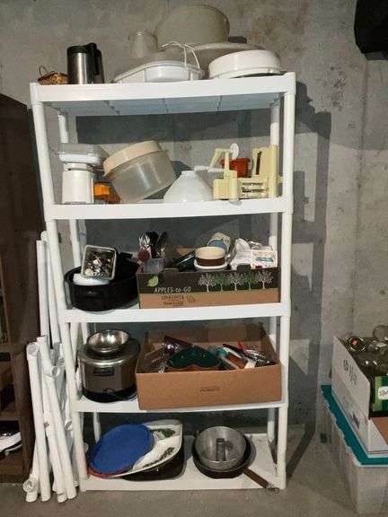 Plastic shelf and contents piping image