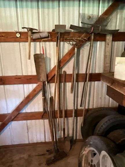 Long handled tools, rakes, shovels, etc. image