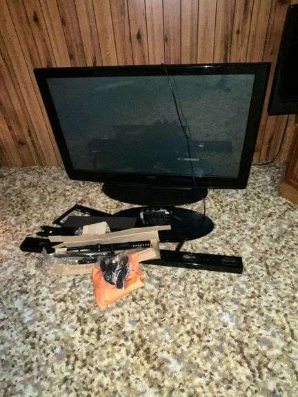 Sanyo flatscreen TV with brackets image