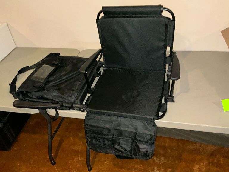 Pair of black stadium chairs image