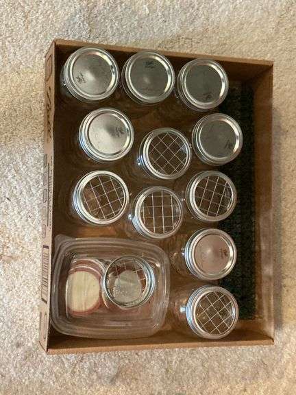 11 Ball pint jars with floral lids image