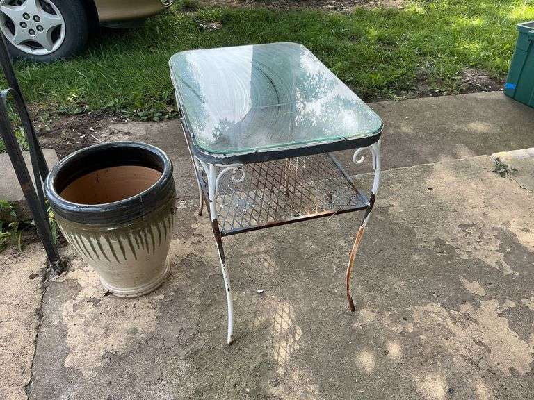 Planter and metal side table with glass top image