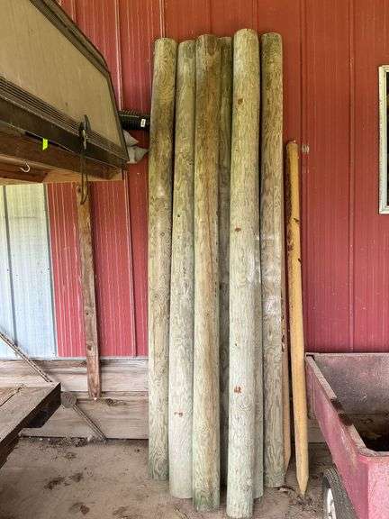 7 wooden posts 6" W x 9' T image