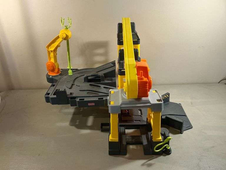 Fisher Price parking garage with elevator lift image