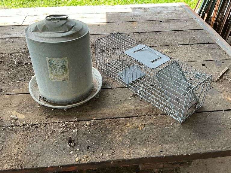 Chicken waterer and animal trap image