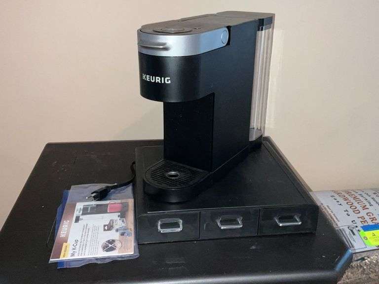 Keurig coffee maker with pod holder stand image