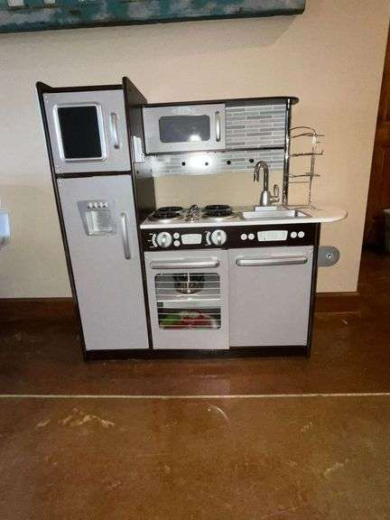 KidKraft child's kitchen with dishes image