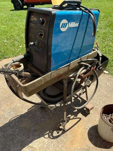 Miller Matic 135 wire welder, 2 helmets image