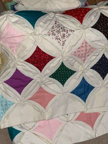 Pieces and parts for cathedral window quilt image