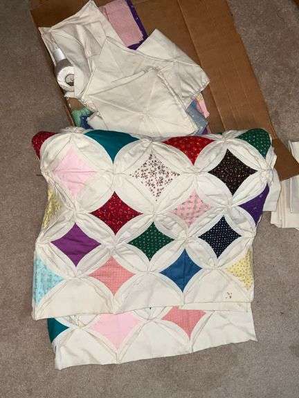 Pieces and parts for cathedral window quilt image