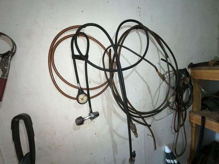 Gauges, box fans, tractor lights, barrel half full of car wash soap, etc.