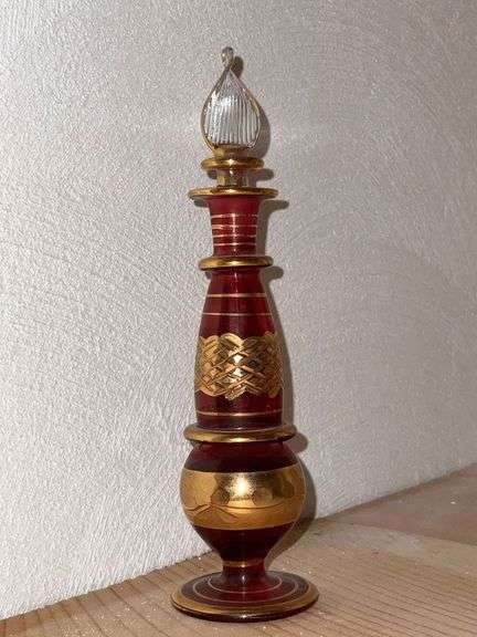 Ruby and gold decorated perfume bottle image
