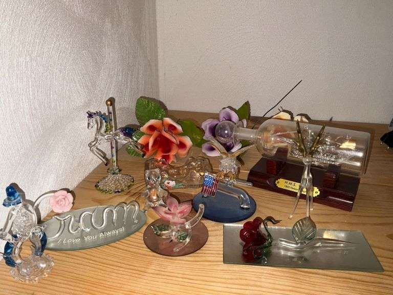 Blown glass pieces, ship in a bottle, porcelain flowers