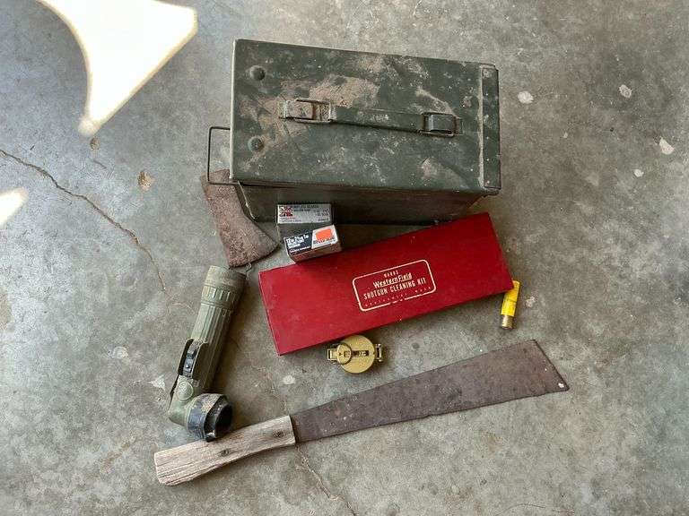 Metal ammo can, military flashlight, compass image